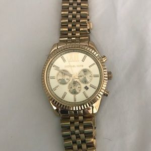 Michael Kors women’s gold watch